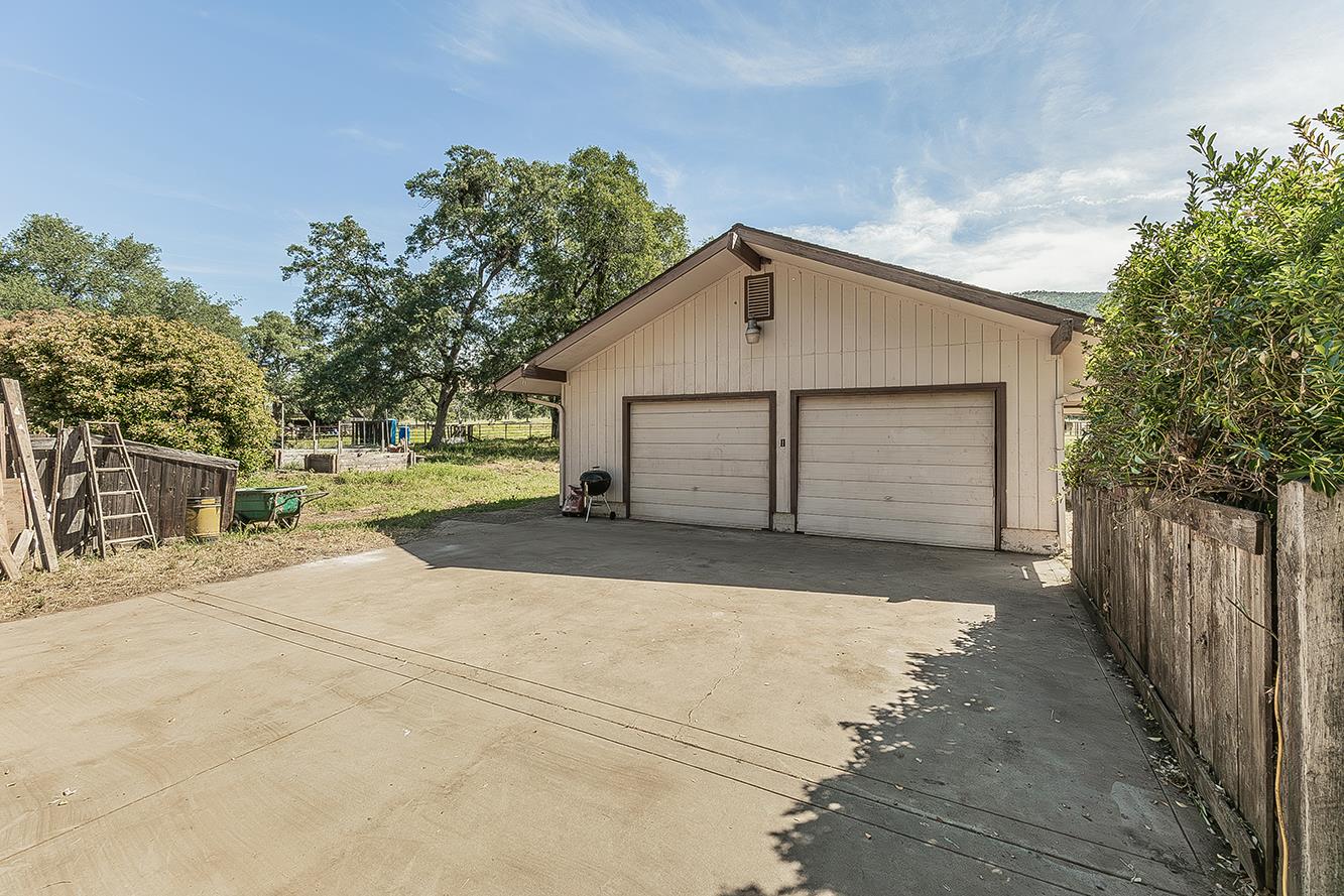 26045 Pittman Hill Road Clovis, CA 93619 - Photo 40 of 93 a view of garage yard and tree