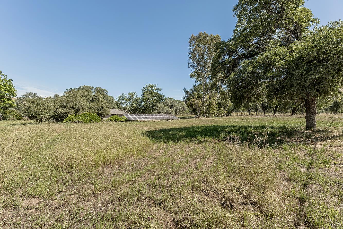 26045 Pittman Hill Road Clovis, CA 93619 - Photo 67 of 93 a view of a lake with houses in the back