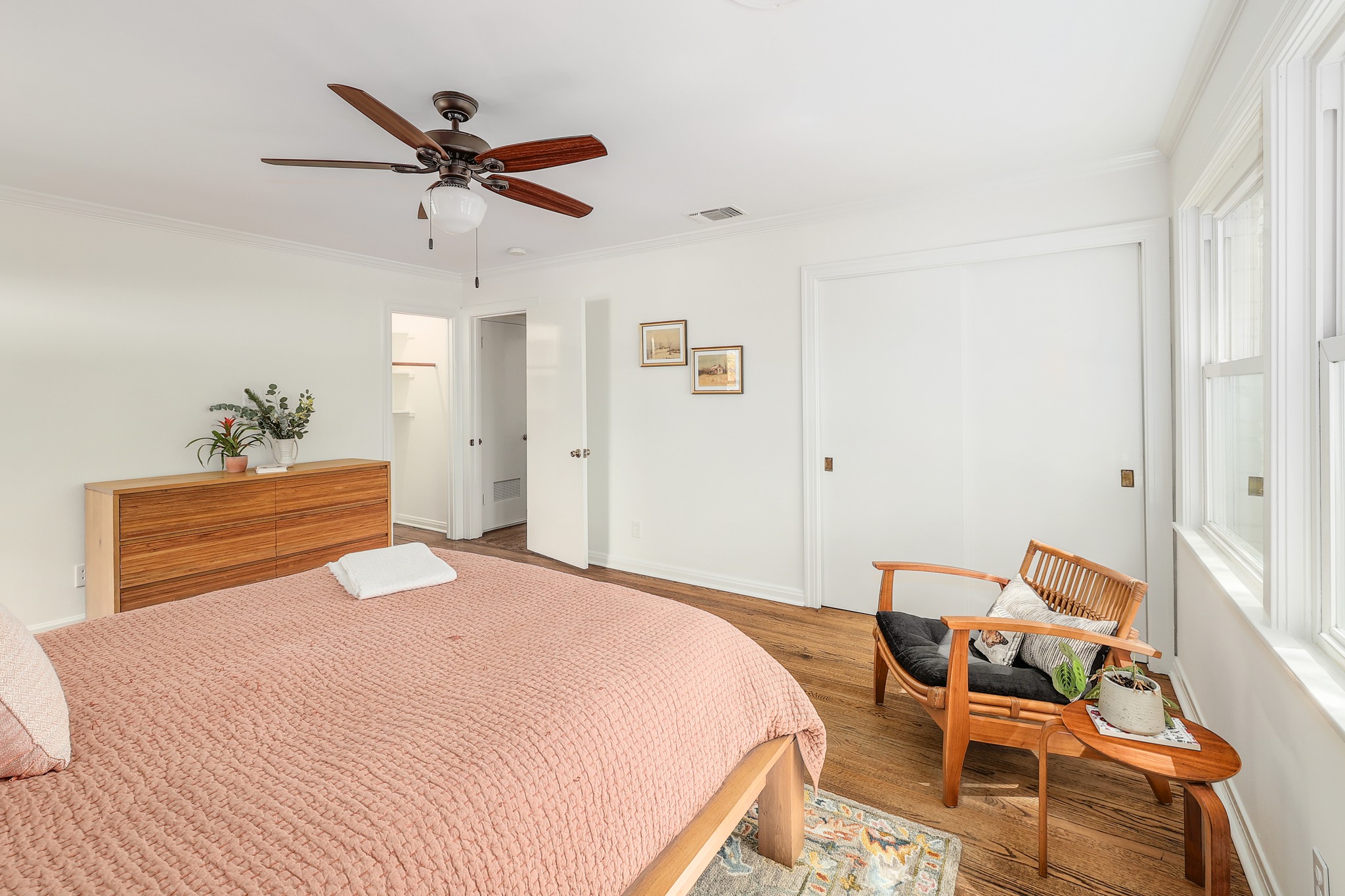 5600 Bull Creek Road Austin, TX 78756 - Photo 15 of 33 a bedroom with a bed and window