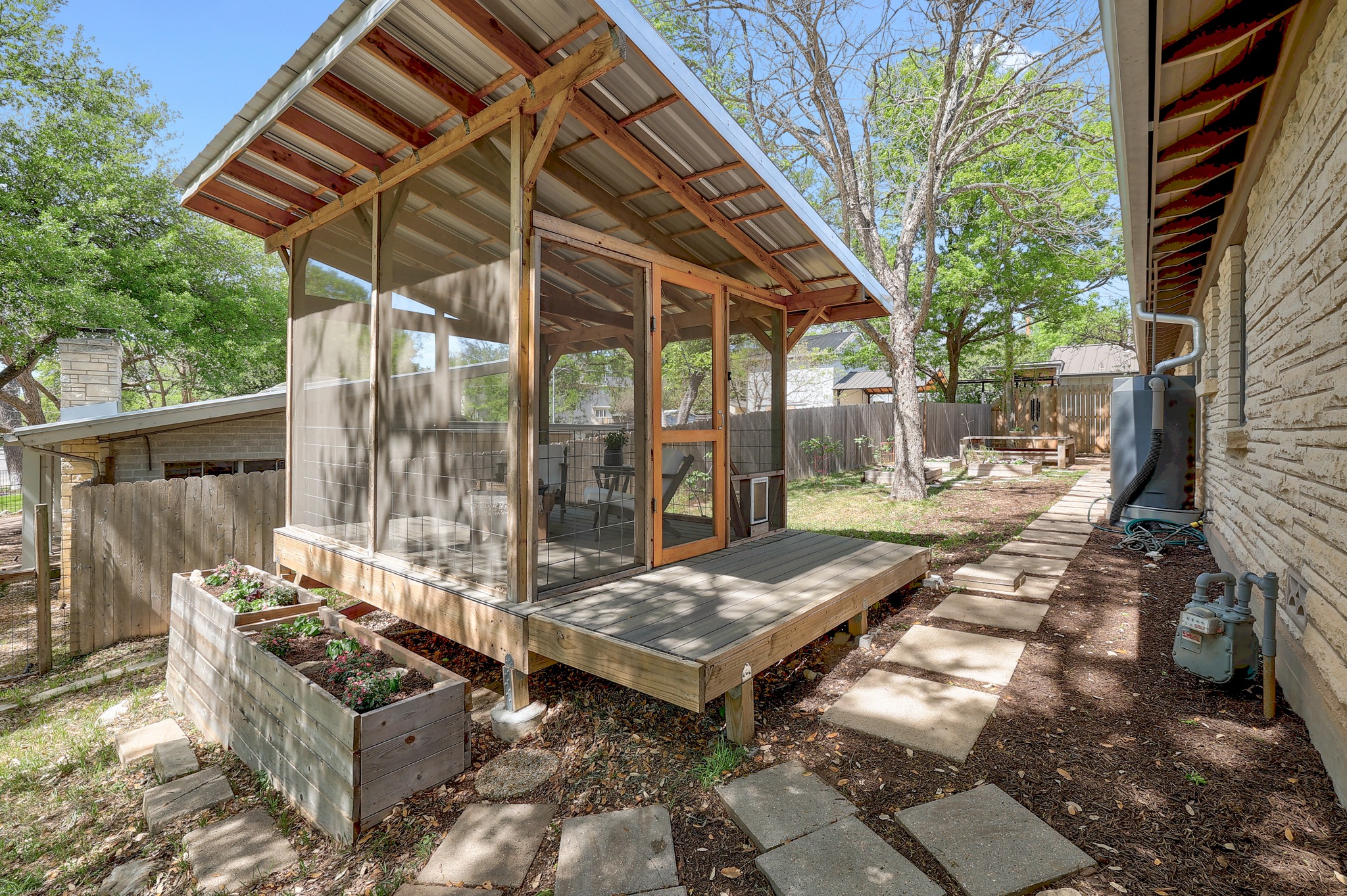 5600 Bull Creek Road Austin, TX 78756 - Photo 24 of 33 a view of a patio with wooden floor