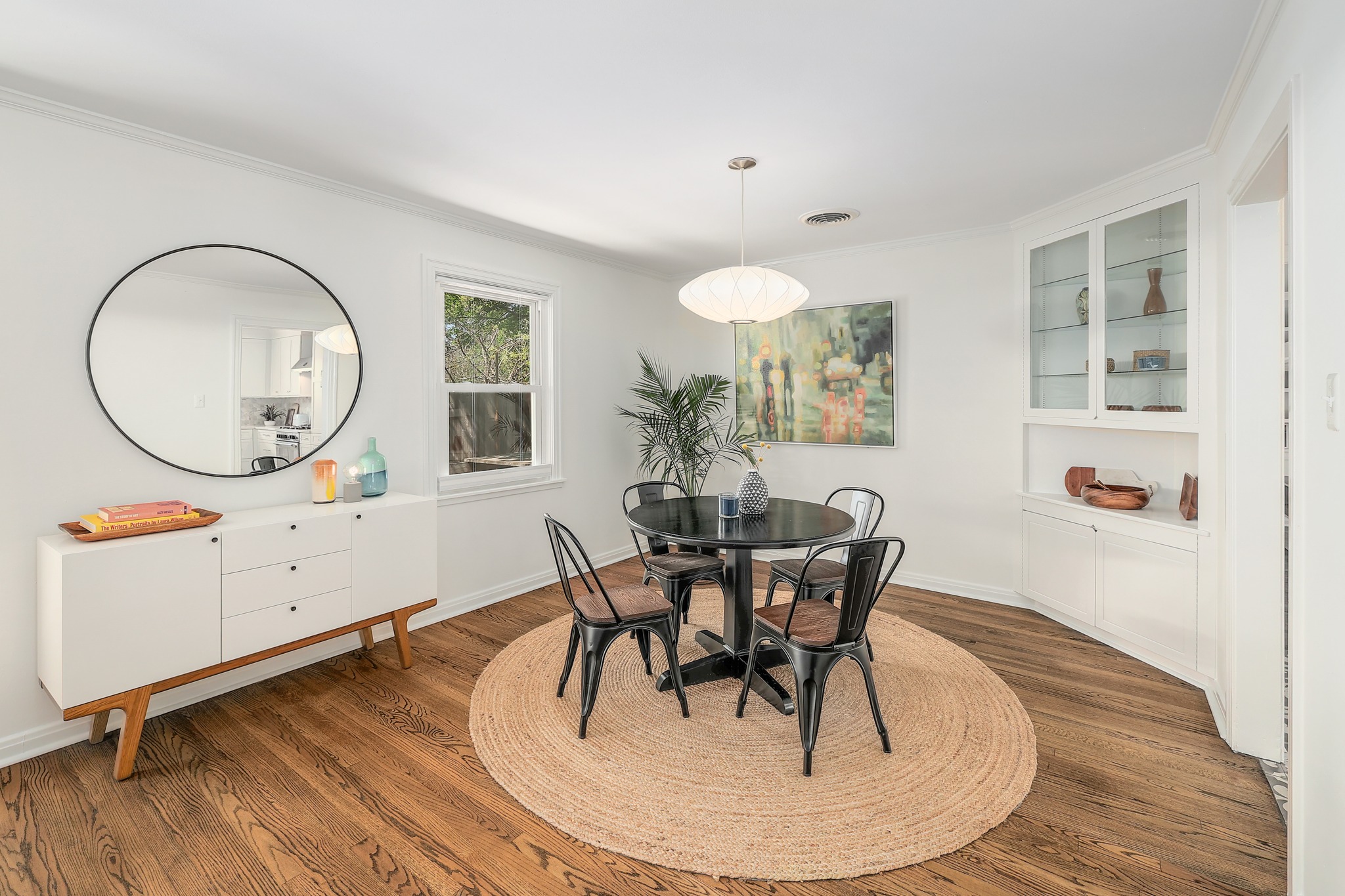 5600 Bull Creek Road Austin, TX 78756 - Photo 6 of 33 a workspace with furniture a potted plant and wooden floor