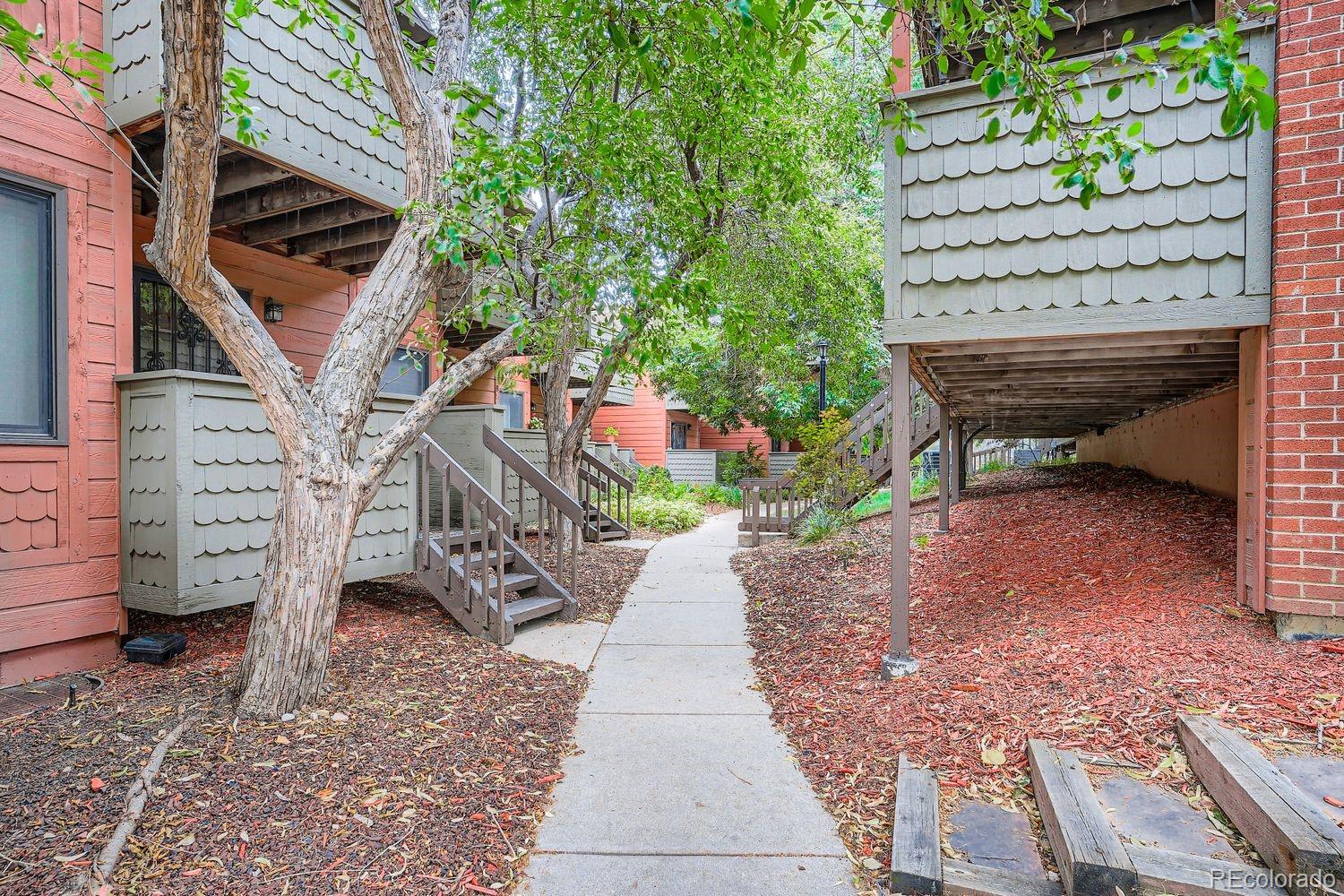 3050 West 32nd Avenue, Unit 102C Denver, CO 80211 - Photo 24 of 36 a view of a pathway with a house