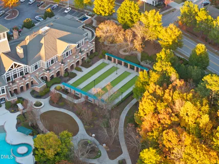 a view of swimming pool with outdoor seating