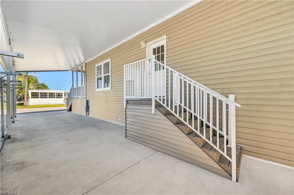 22 Enchanting Boulevard, Unit E22 Naples, FL 34112 - Photo 20 of 20 a view of a balcony with stairs