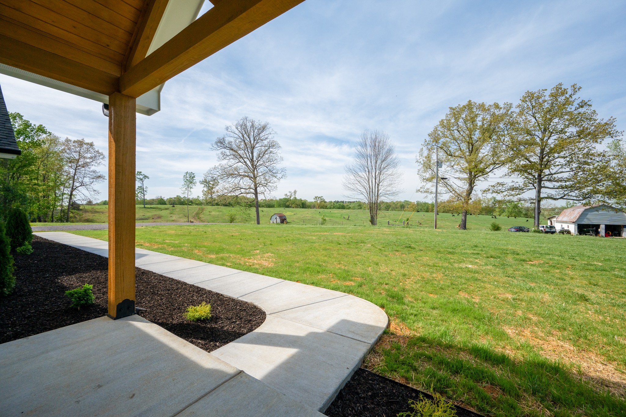 625 Robert Smith Road McMinnville, TN 37110 - Photo 12 of 40 a view of a garden with a tree