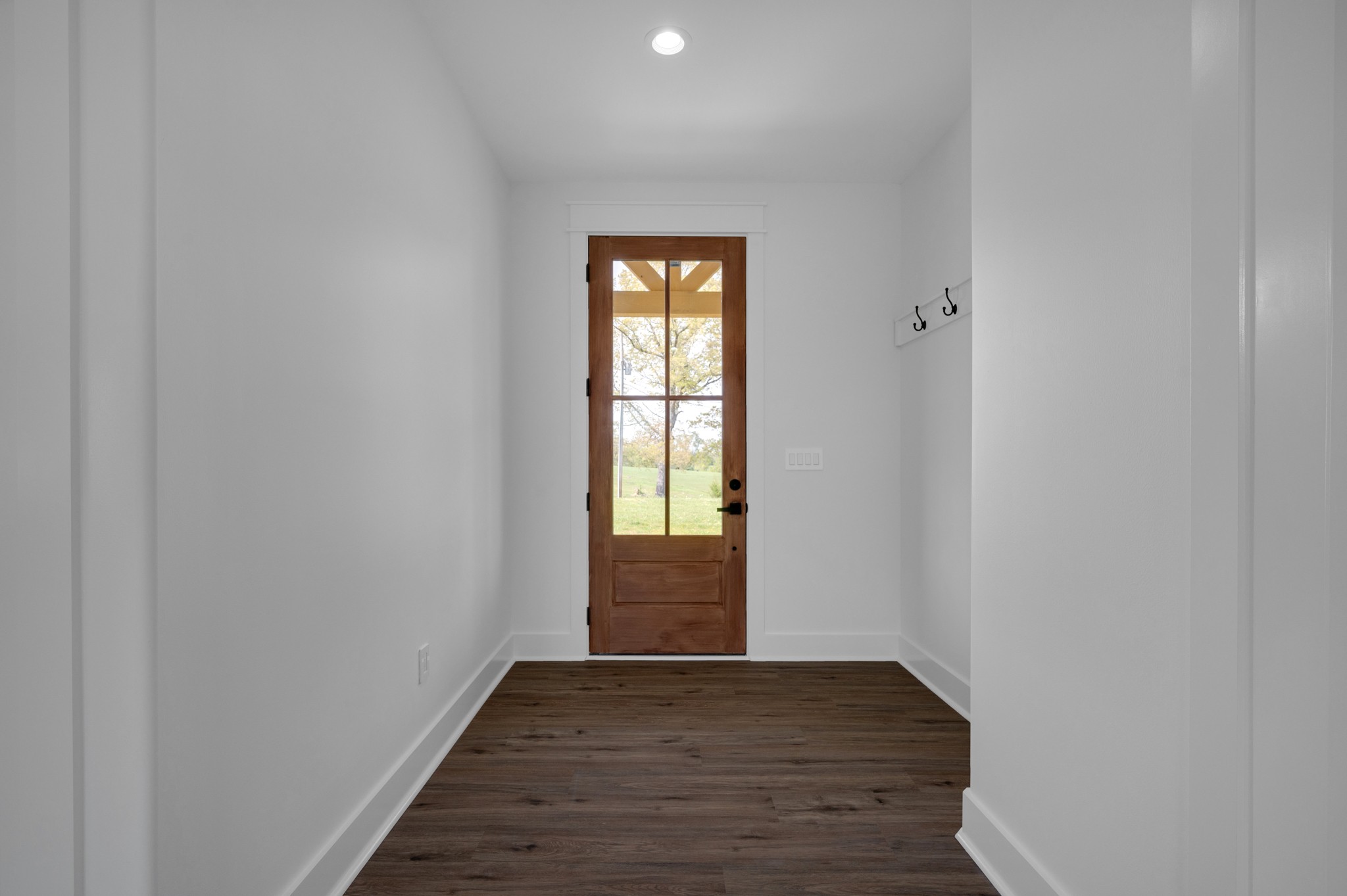 625 Robert Smith Road McMinnville, TN 37110 - Photo 15 of 40 a view of an empty room with wooden floor and a window