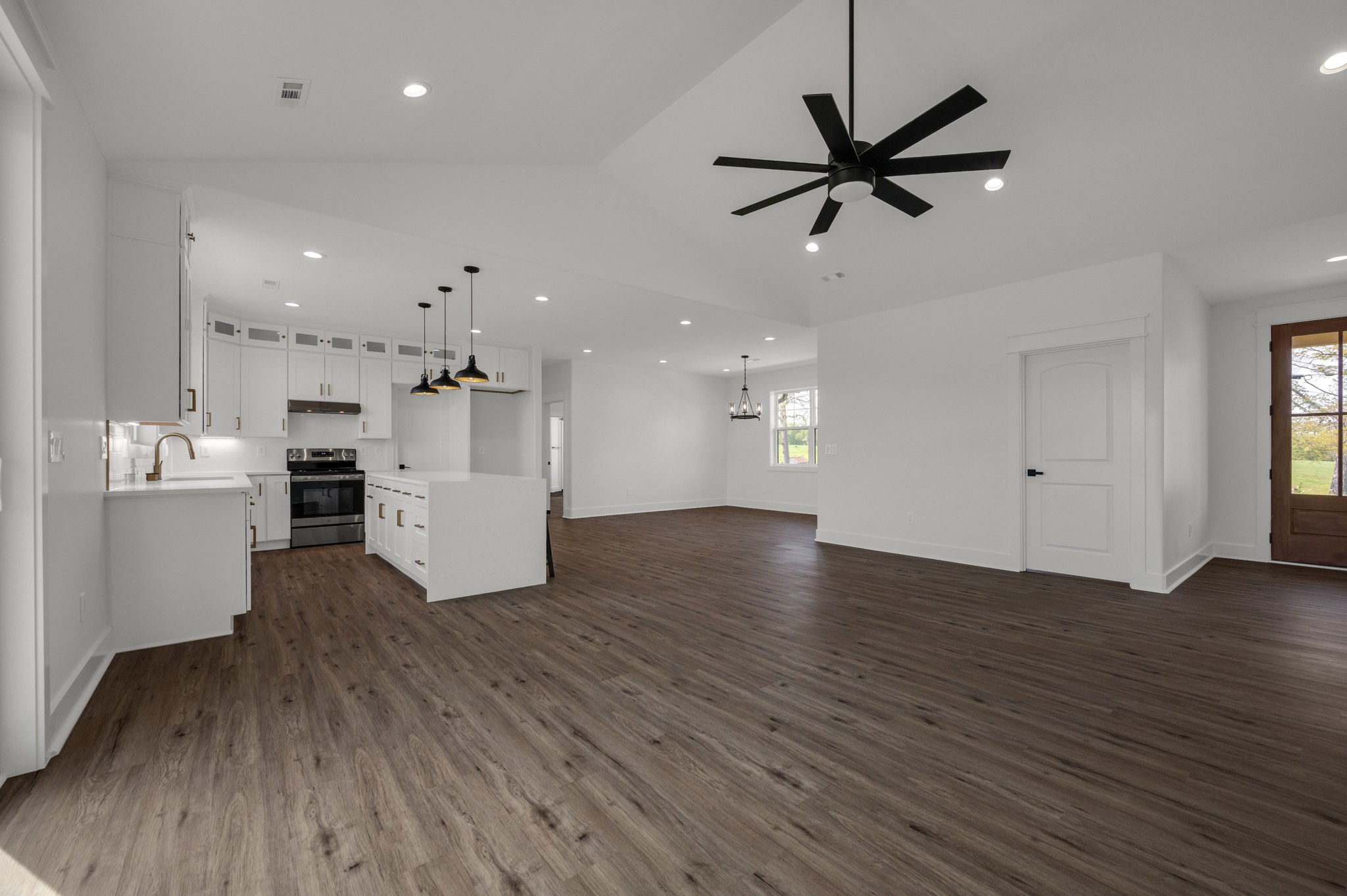 625 Robert Smith Road McMinnville, TN 37110 - Photo 16 of 40 a view of a kitchen with wooden floor and a kitchen