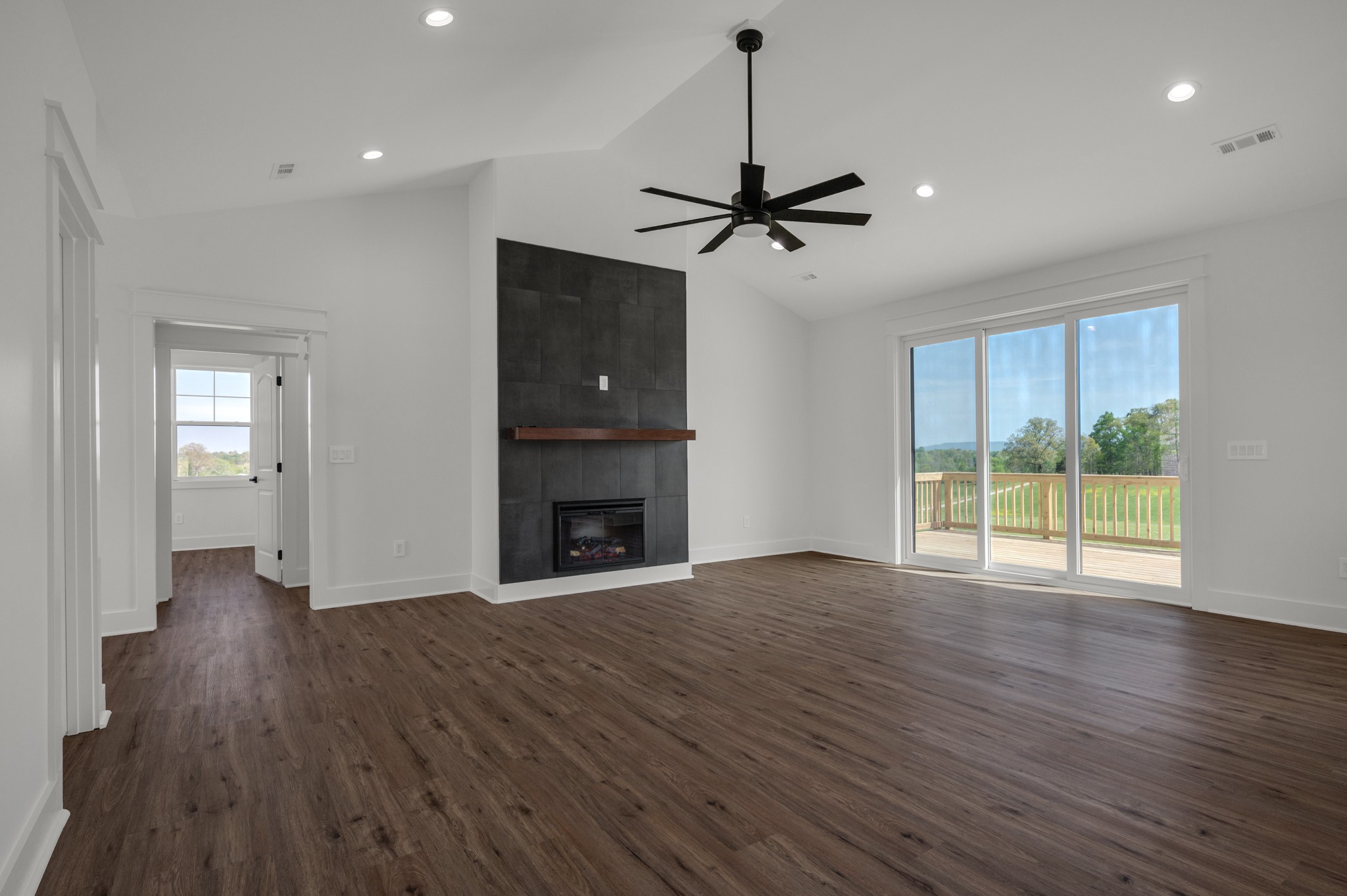 625 Robert Smith Road McMinnville, TN 37110 - Photo 18 of 40 a view of empty room with wooden floor and fan