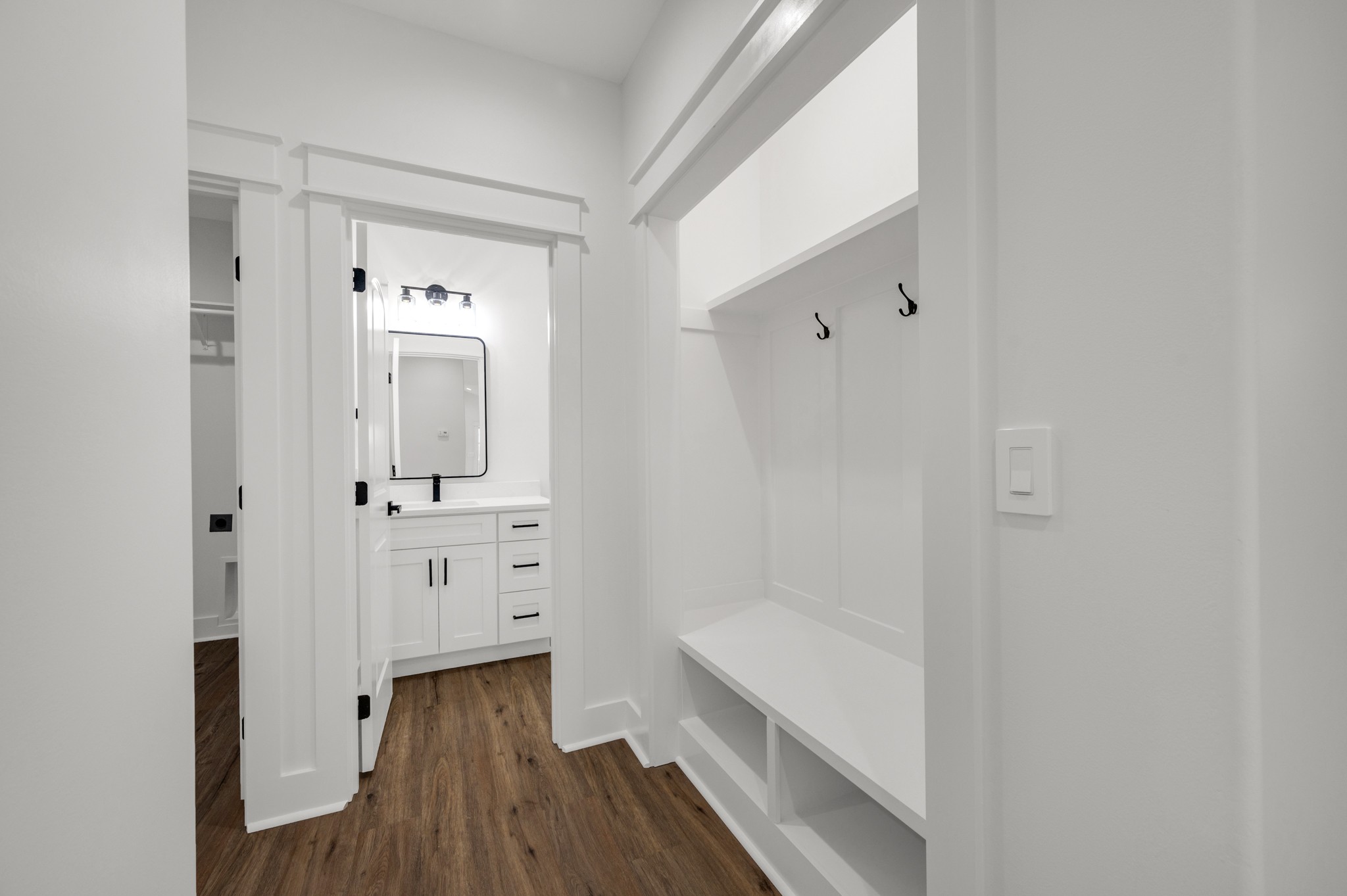 625 Robert Smith Road McMinnville, TN 37110 - Photo 30 of 40 a bathroom with a double vanity sink a mirror and a bathtub