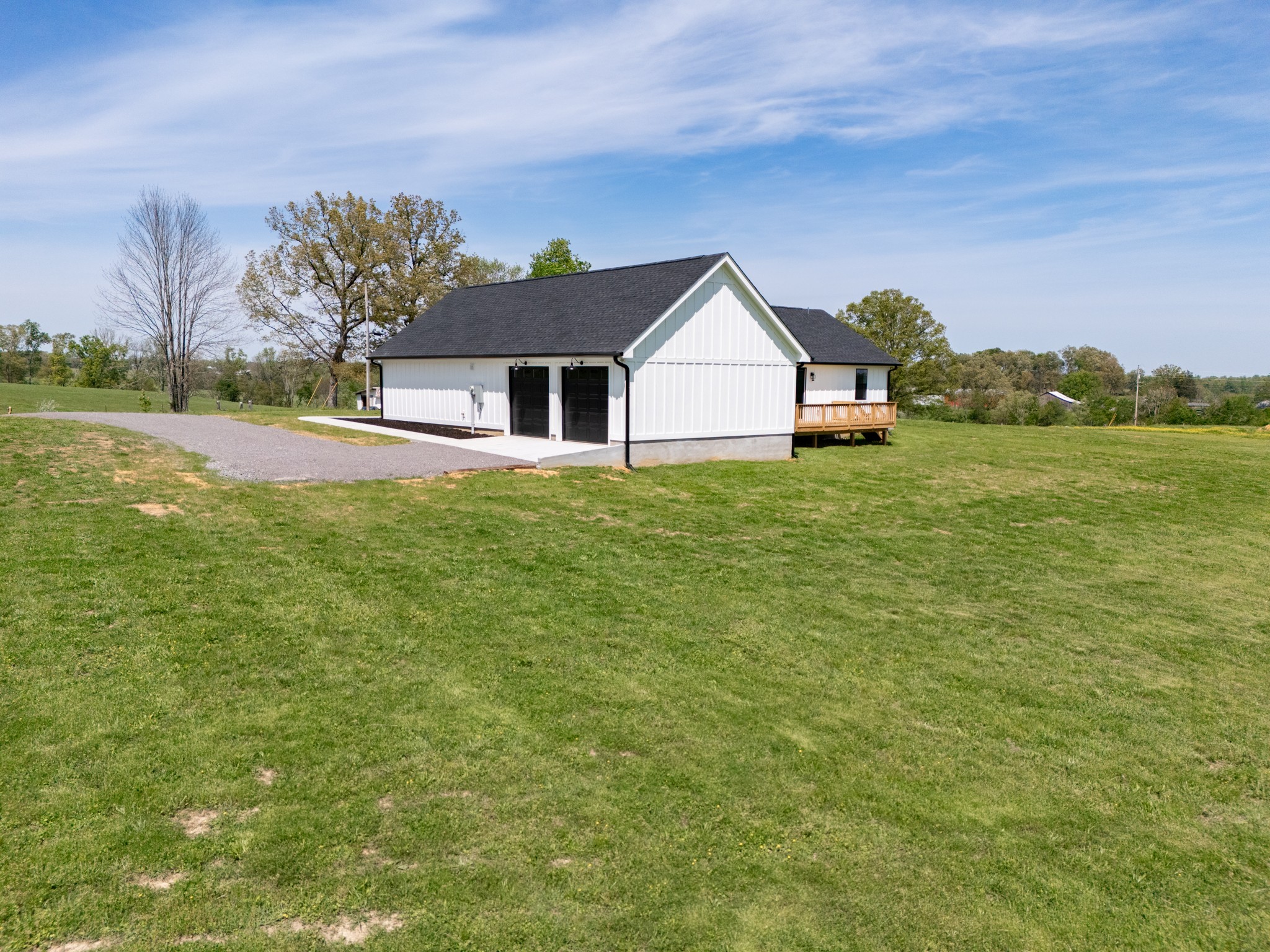 625 Robert Smith Road McMinnville, TN 37110 - Photo 6 of 40 a front view of a house with a yard and trees