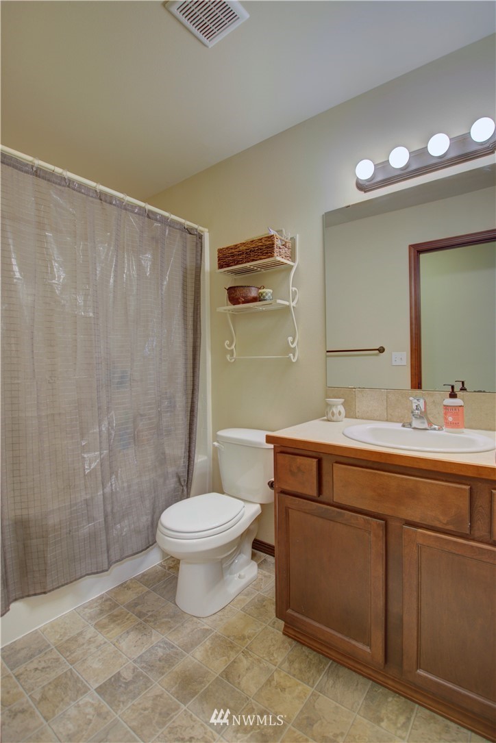 5138 180th Trail Southwest Rochester, WA 98579 - Photo 25 of 33 a bathroom with a sink toilet and shower