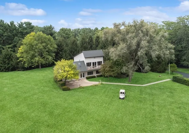 a view of a house with a big yard