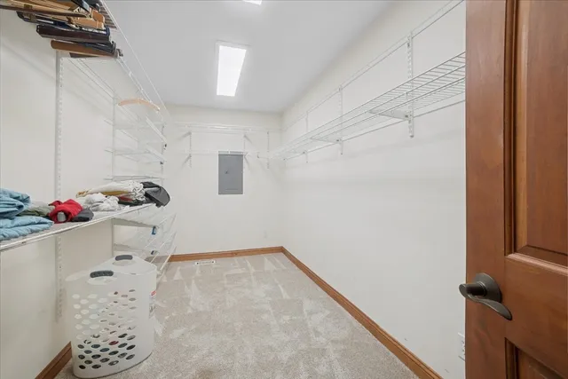 a bathroom with a bathtub sink and mirror