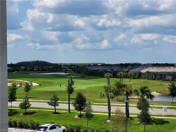 a view of a lake with a big yard