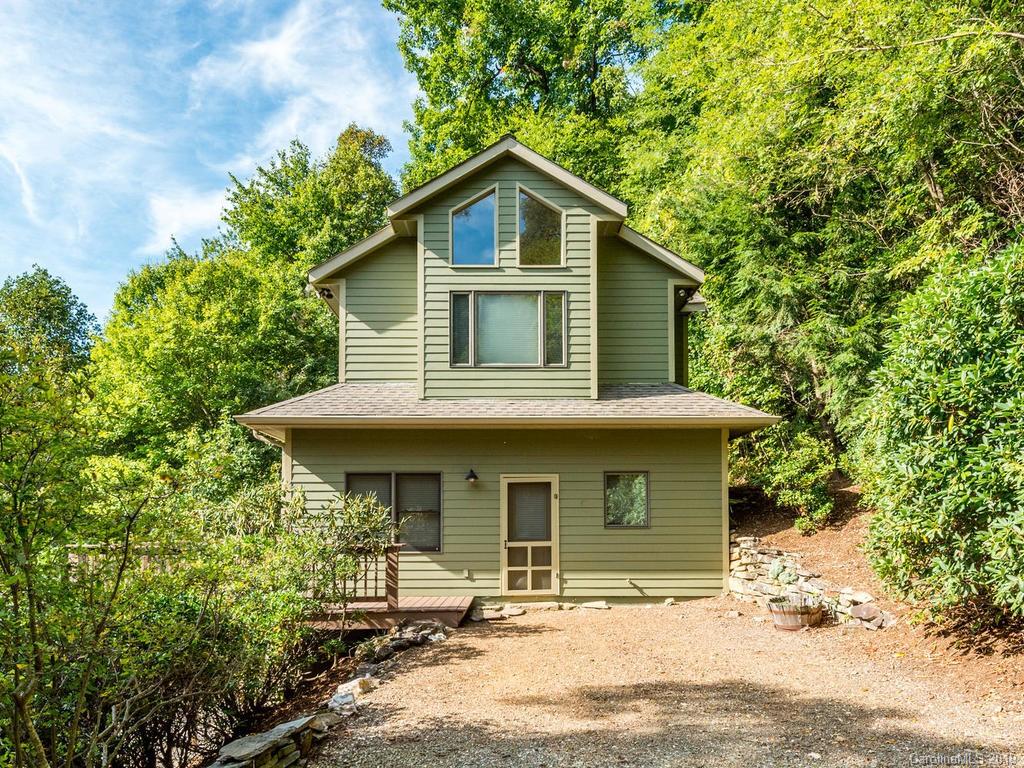 a front view of a house with a porch