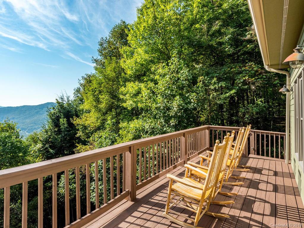 1299 Pine Ridge Road Burnsville, NC 28714 - Photo 30 of 41 a view of balcony with wooden floor and fence