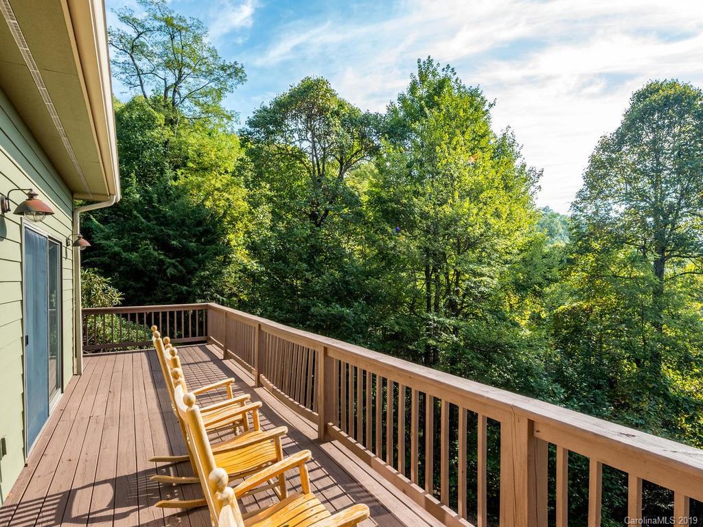 1299 Pine Ridge Road Burnsville, NC 28714 - Photo 31 of 41 a view of balcony with wooden floor and fence