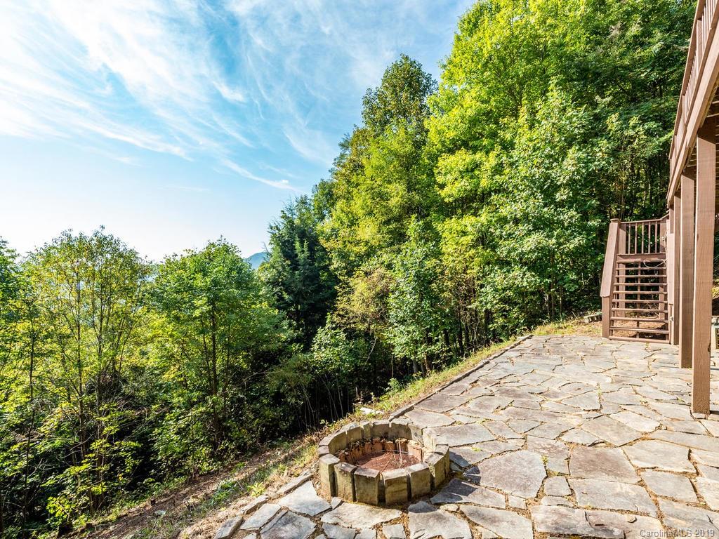 1299 Pine Ridge Road Burnsville, NC 28714 - Photo 34 of 41 a view of an outdoor space and a yard