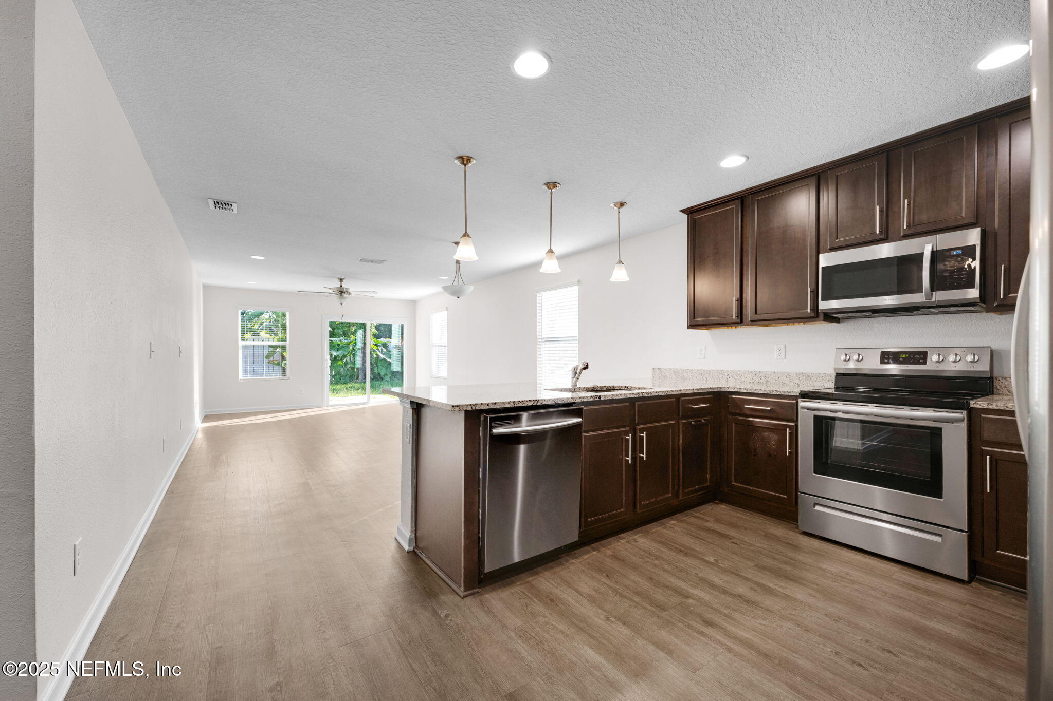 1632 Bermuda Road Jacksonville, FL 32224 - Photo 6 of 25 Kitchen Overlooking Living Area