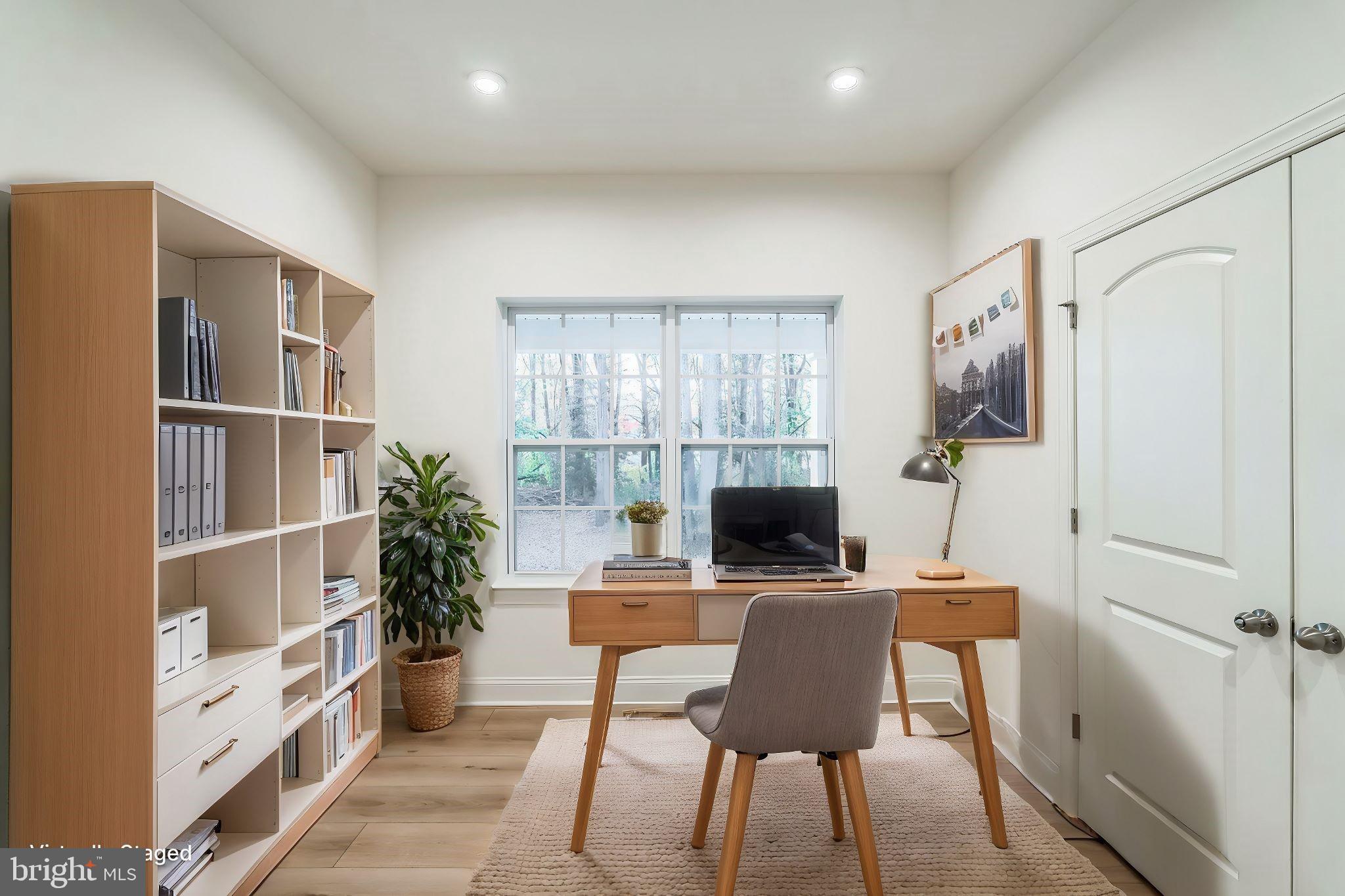 147 A Rocktown Road Ringoes, NJ 08551 - Photo 12 of 49 a view of a workspace with furniture and a potted plant