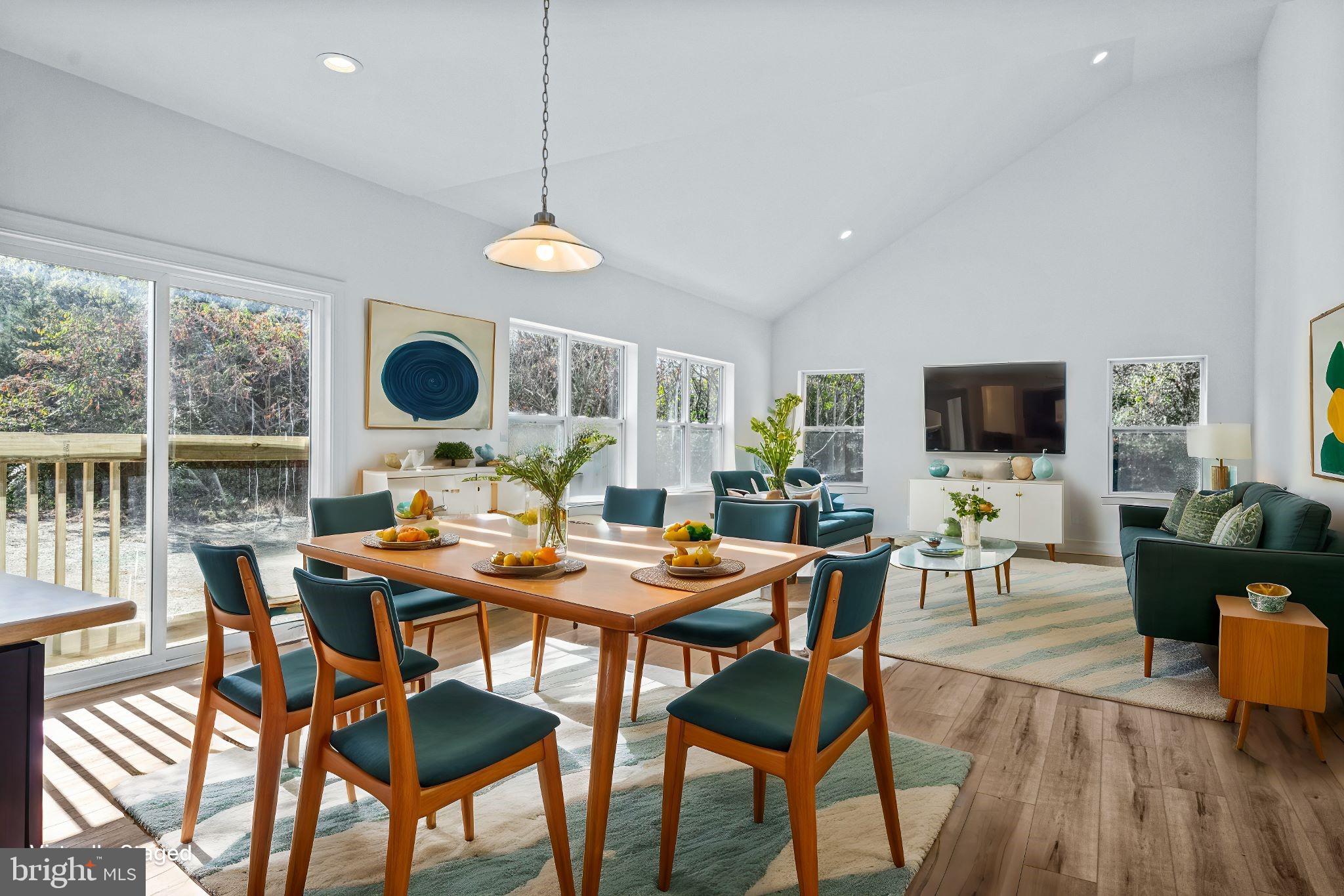 147 A Rocktown Road Ringoes, NJ 08551 - Photo 19 of 49 a dining room with furniture a window and wooden floor