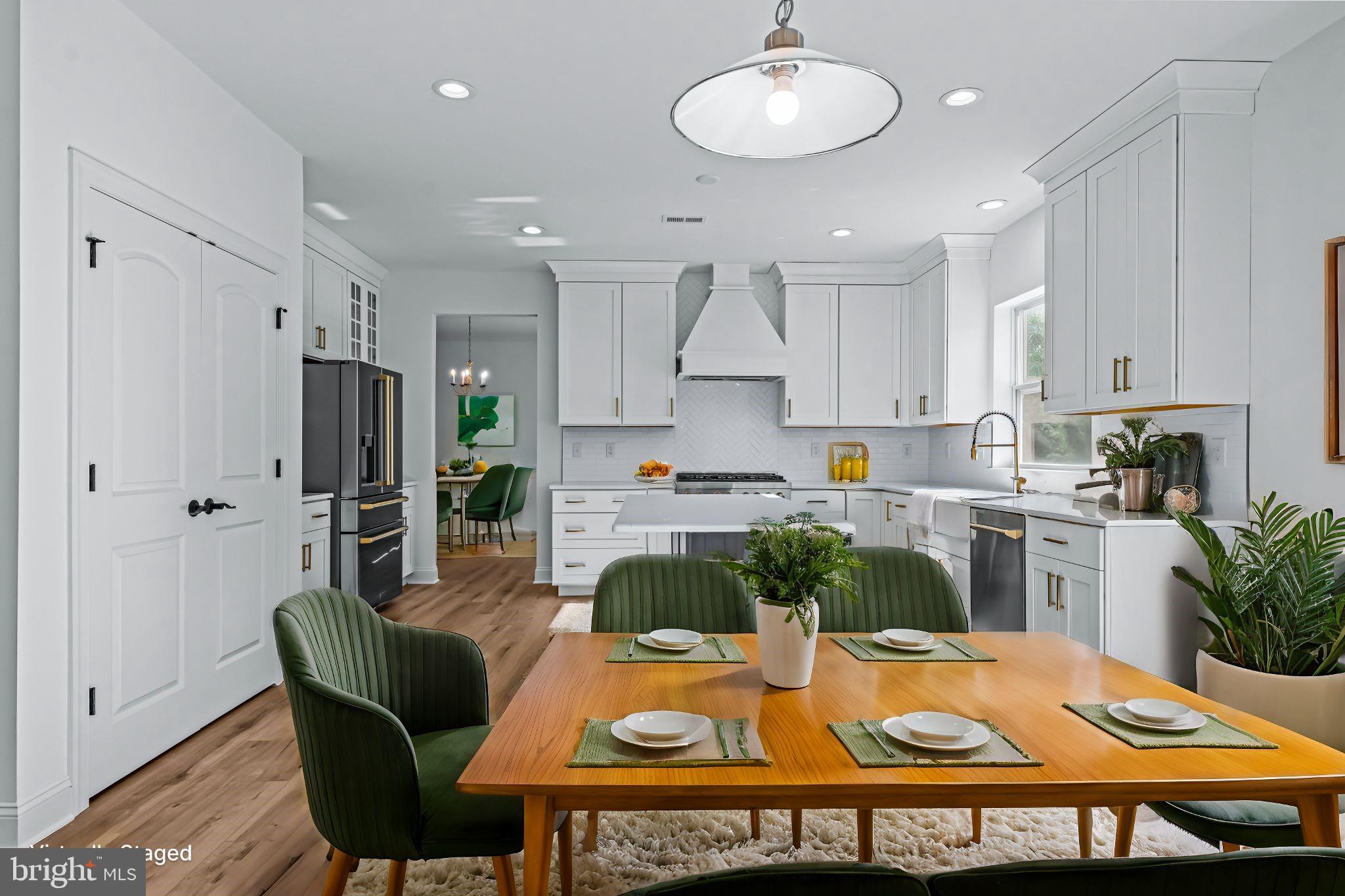 147 A Rocktown Road Ringoes, NJ 08551 - Photo 27 of 49 a kitchen with stainless steel appliances granite countertop a refrigerator a stove a sink dishwasher and white cabinets with wooden floor