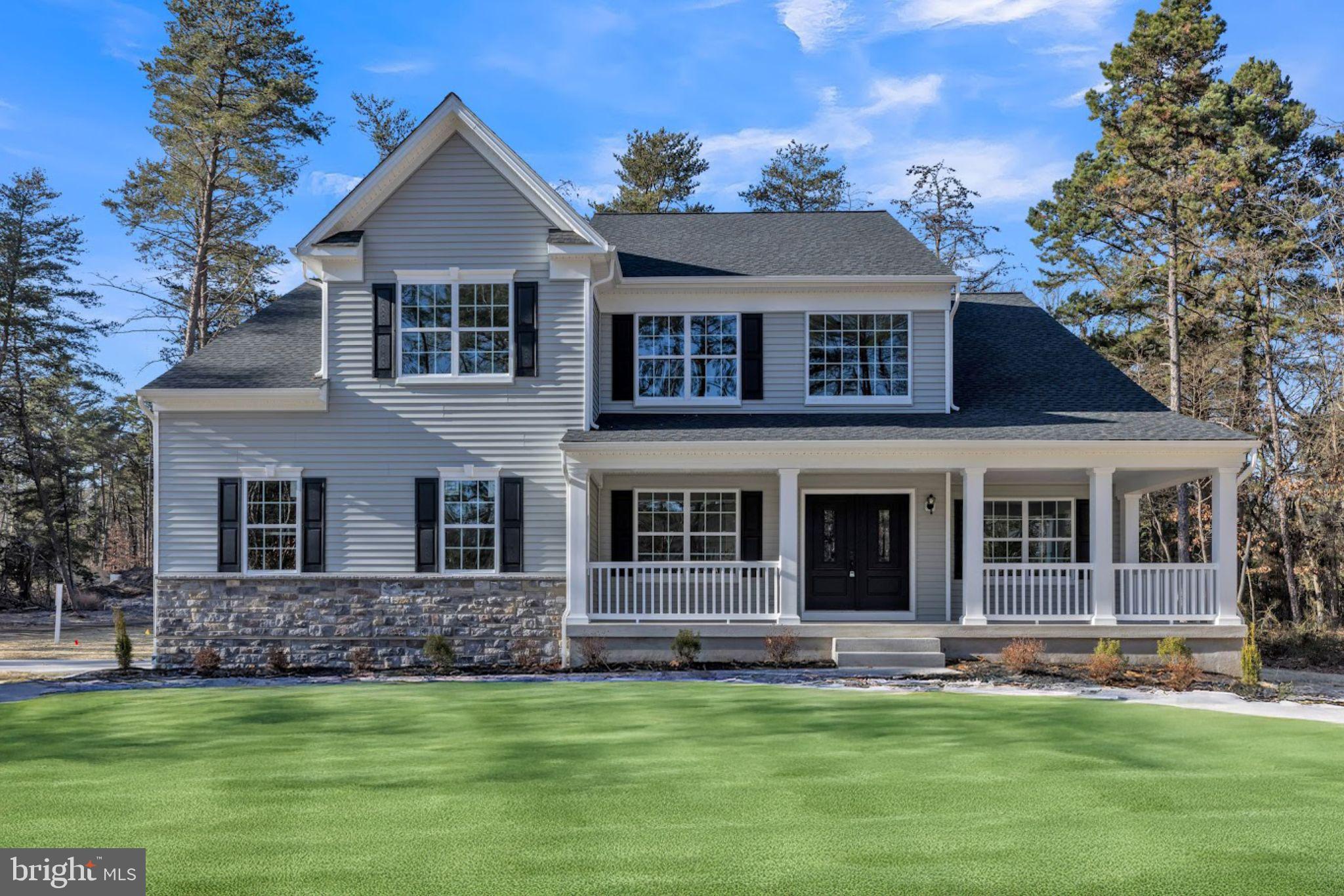 147 A Rocktown Road Ringoes, NJ 08551 - Photo 30 of 49 a front view of a house with a garden