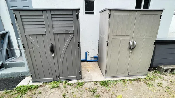 a view of a backyard with a garden