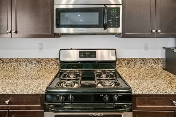 a bedroom with a bed and furniture