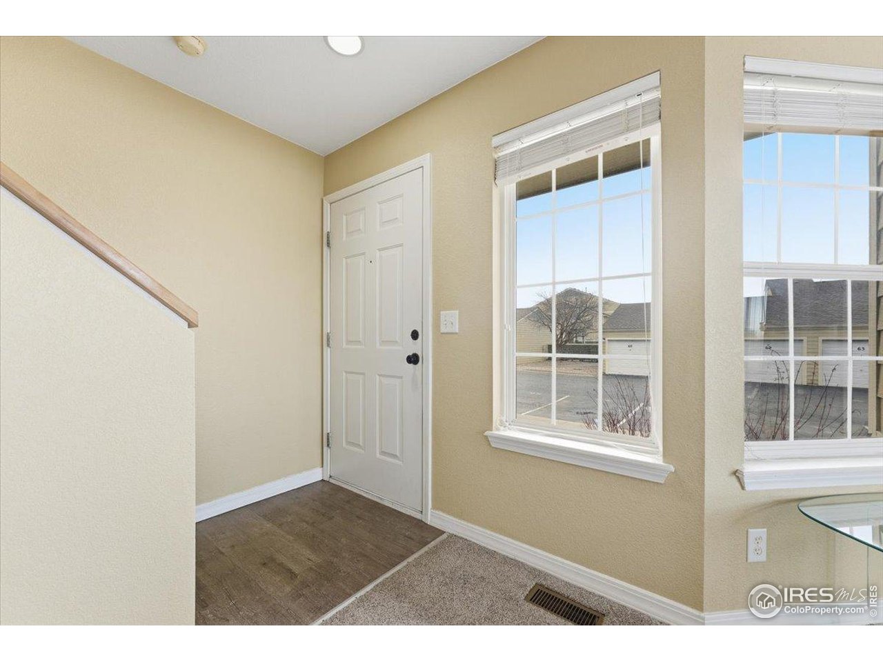 930 Button Rock Drive, Unit 64 Longmont, CO 80504 - Photo 12 of 23 a view of an empty room with a window