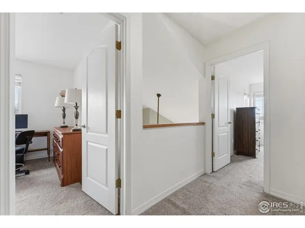 a room with furniture and a wooden floor