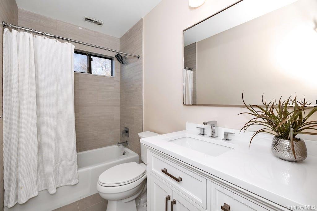 103 Rambling Brook Road Chappaqua, NY 10514 - Photo 19 of 33 a bathroom with a sink a toilet and shower
