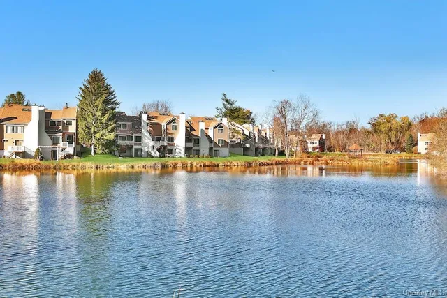 a view of swimming pool with a patio