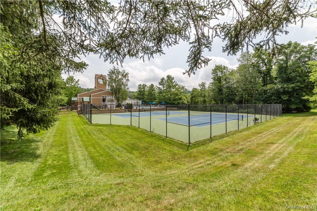 103 Rambling Brook Road Chappaqua, NY 10514 - Photo 31 of 33 a view of a backyard with swimming pool