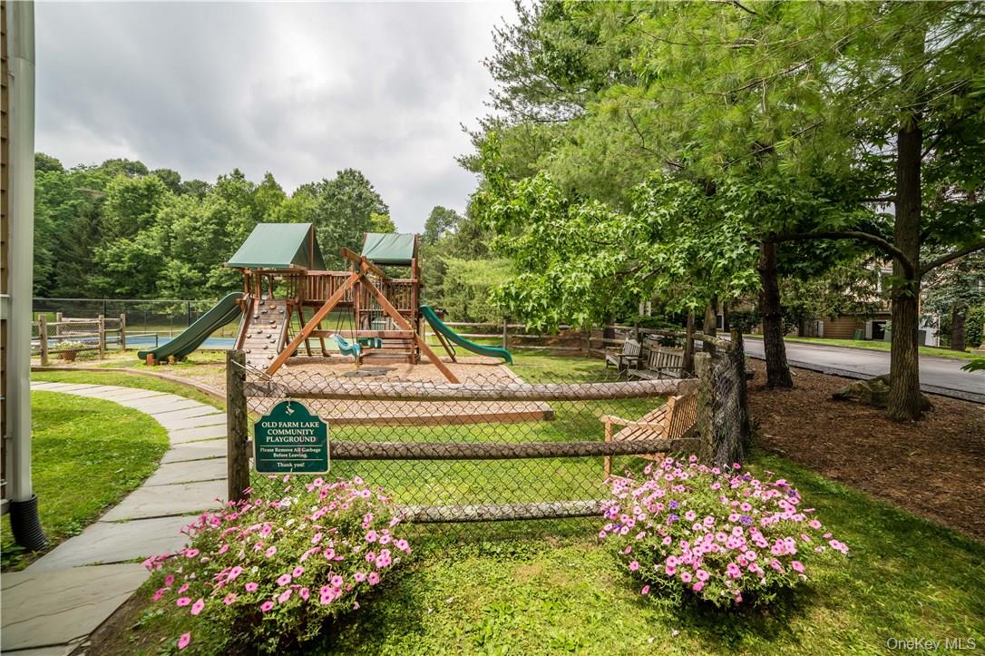 103 Rambling Brook Road Chappaqua, NY 10514 - Photo 32 of 33 a garden view with a fountain
