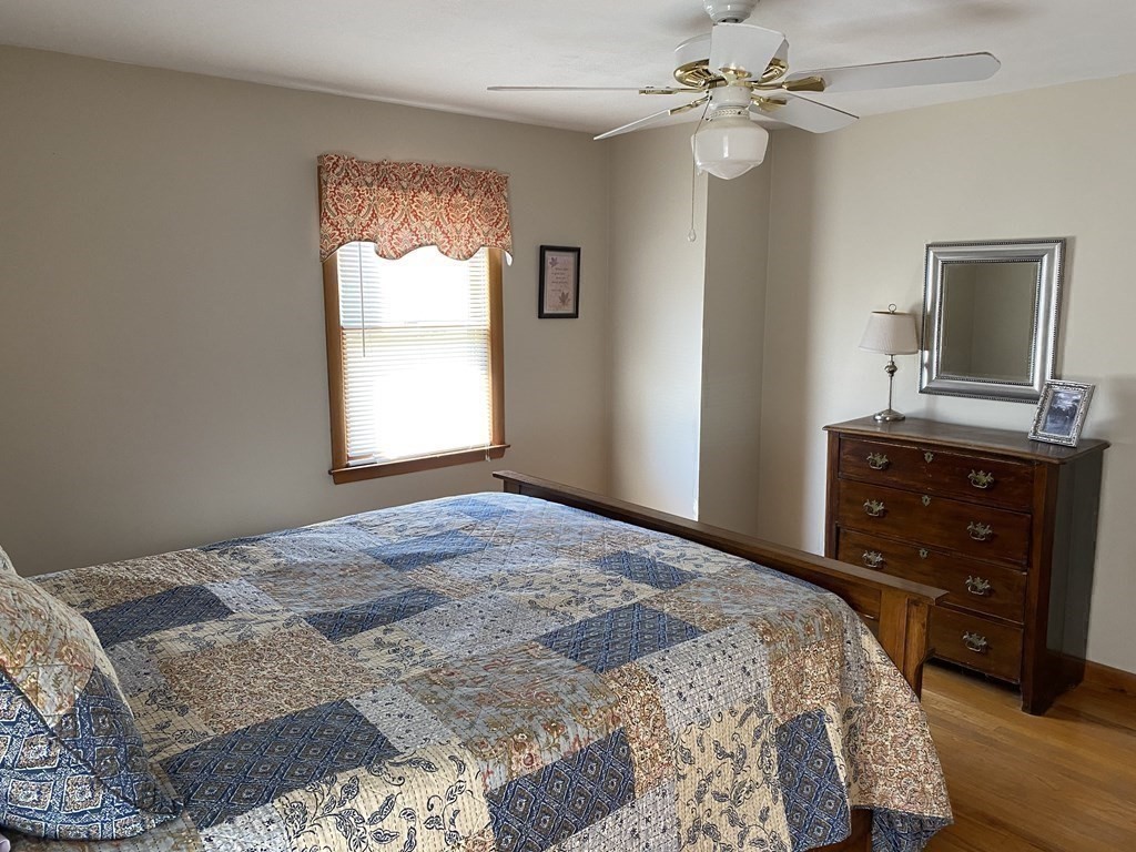 230 Straits Road Hatfield, MA 01038 - Photo 14 of 23 a bedroom with a bed dresser and a window