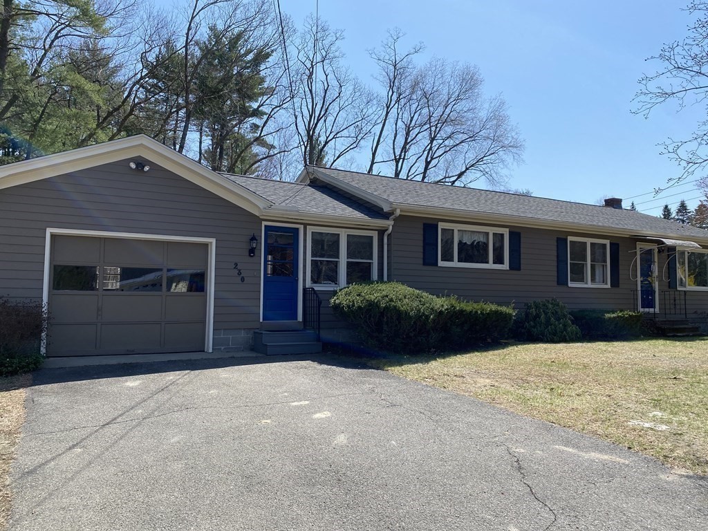 230 Straits Road Hatfield, MA 01038 - Photo 3 of 23 a front view of a house with a yard and garage