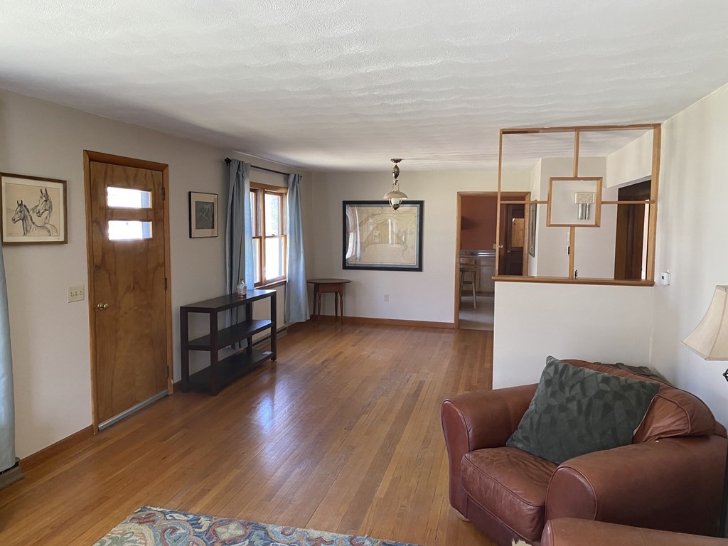 230 Straits Road Hatfield, MA 01038 - Photo 8 of 23 a living room with furniture and a wooden floor