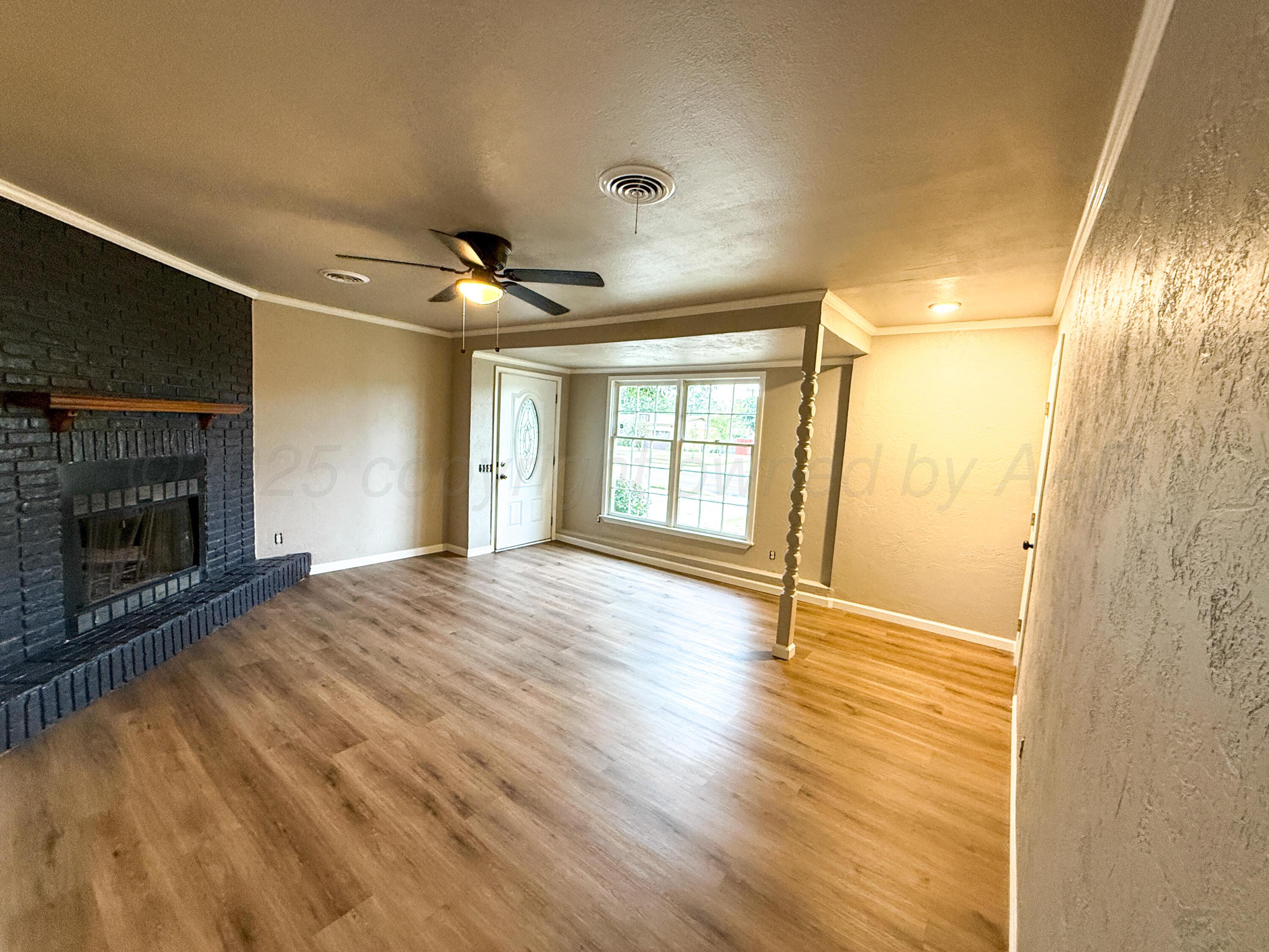 4708 South Bryan Street Amarillo, TX 79110 - Photo 6 of 18 living room entryway