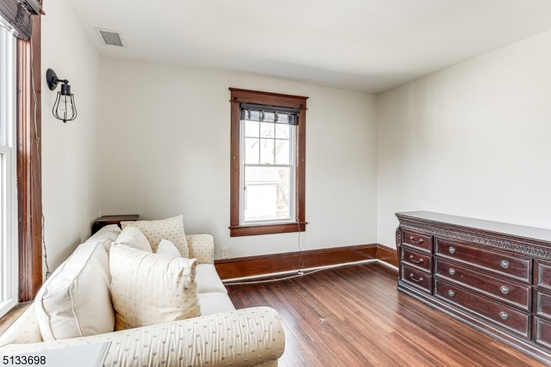 11 Village Road New Vernon, NJ 07976 - Photo 17 of 26 a living room with furniture and wooden floor