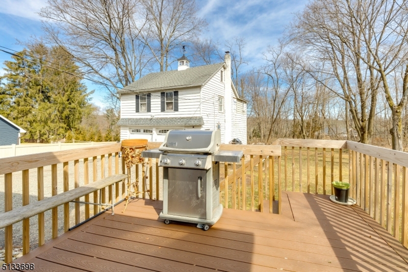 11 Village Road New Vernon, NJ 07976 - Photo 22 of 26 a view of a house with wooden fence