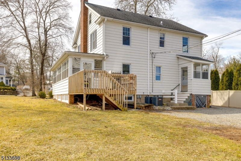 11 Village Road New Vernon, NJ 07976 - Photo 23 of 26 a view of house with a yard