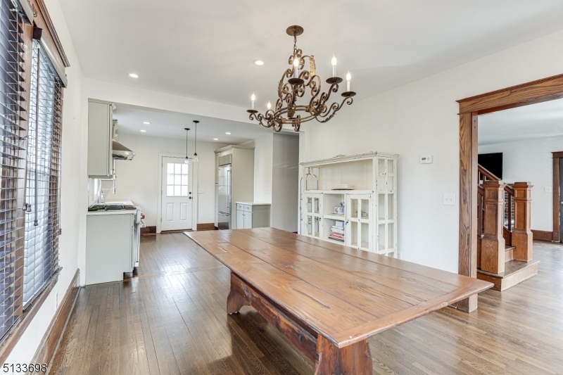11 Village Road New Vernon, NJ 07976 - Photo 6 of 26 a view of a room with wooden floor and windows