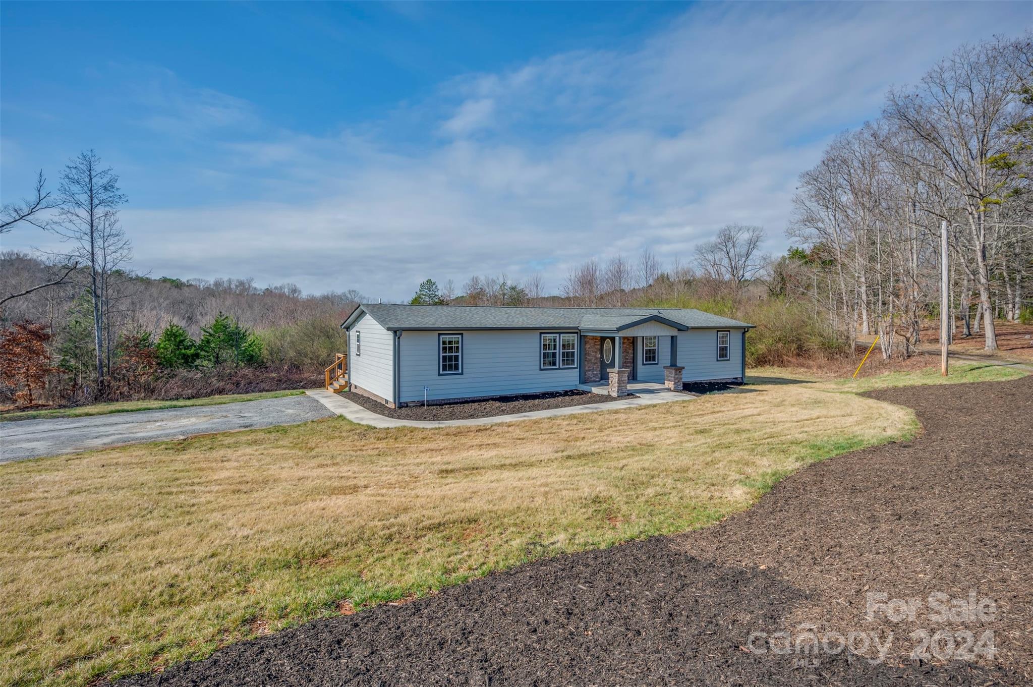 163 Mountain Creek Road Rutherfordton, NC 28139 - Photo 34 of 35 a view of a house with a yard