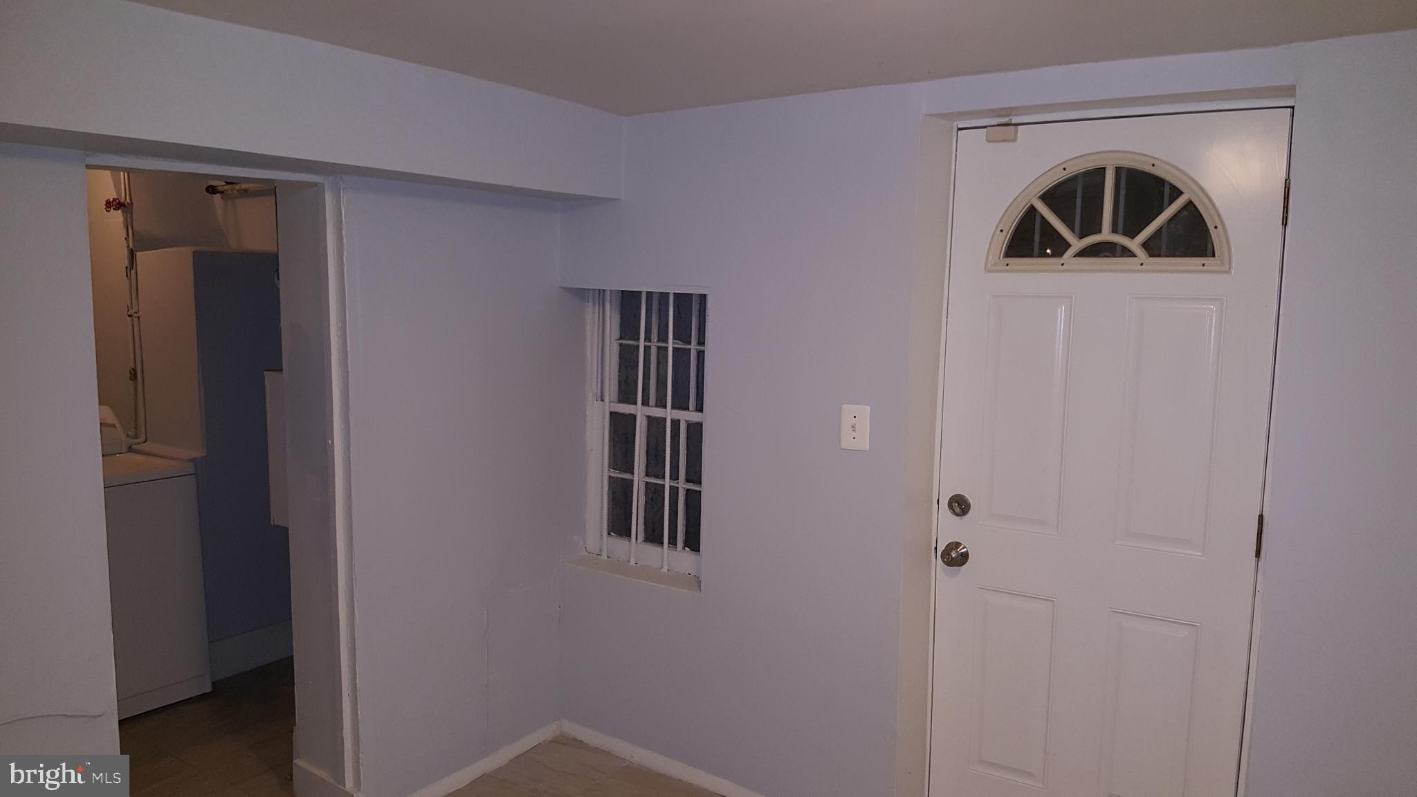 624 Stirling Street Baltimore, MD 21202 - Photo 24 of 27 a front view of a house with windows