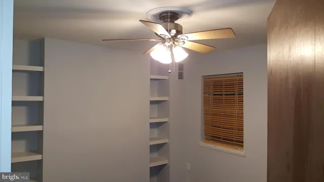 a view of a livingroom with a fan