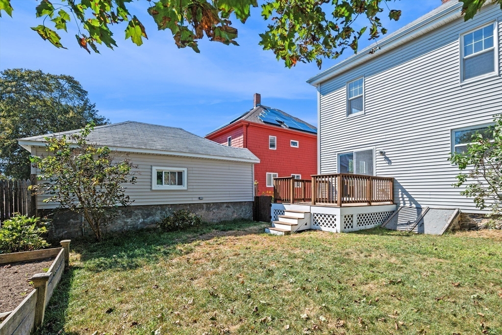 21 Lyman Street Beverly, MA 01915 - Photo 28 of 33 a front view of a house with garden