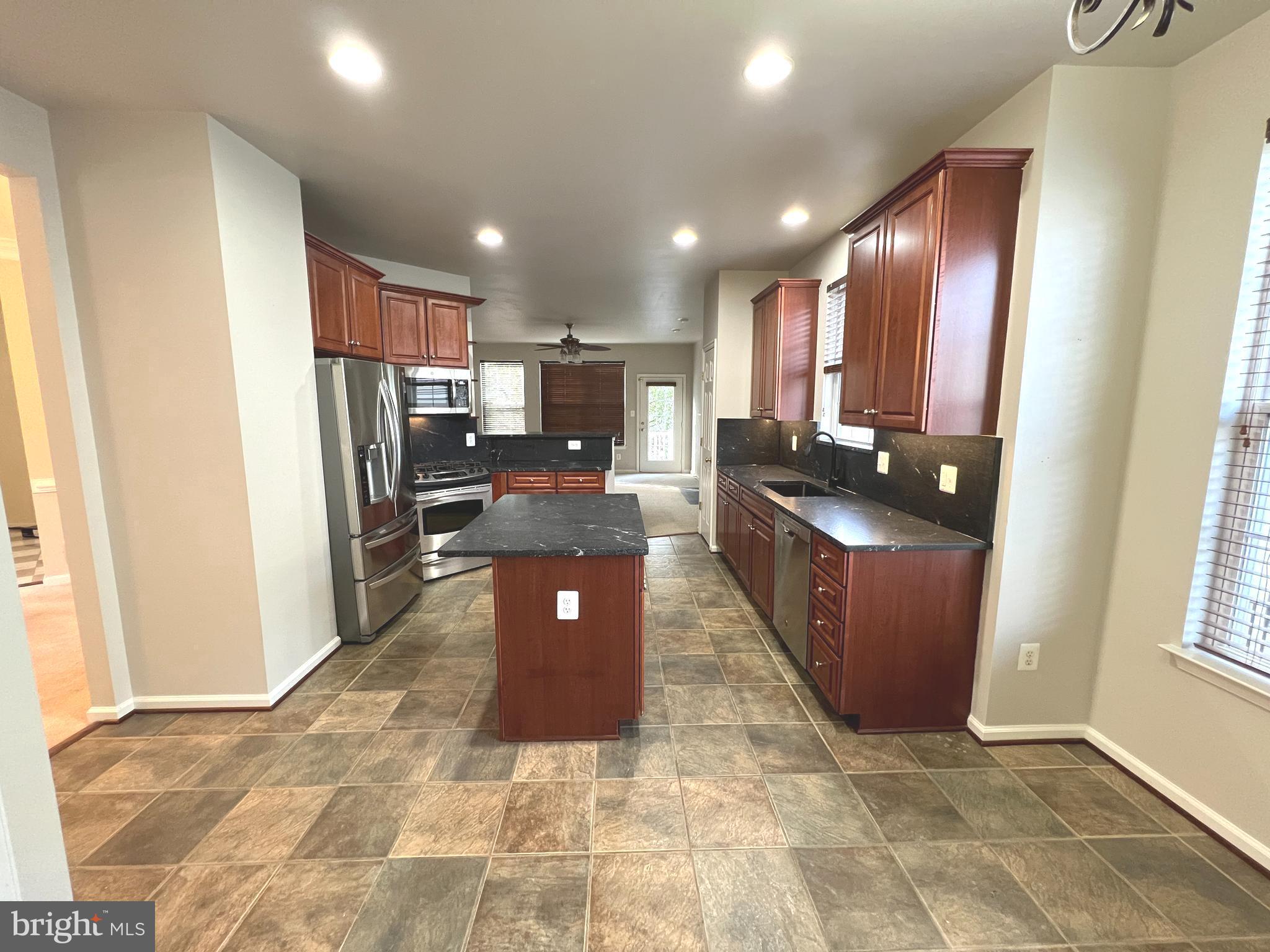 8378 Tillett Loop Manassas, VA 20110 - Photo 2 of 30 Island kitchen w/granite counters