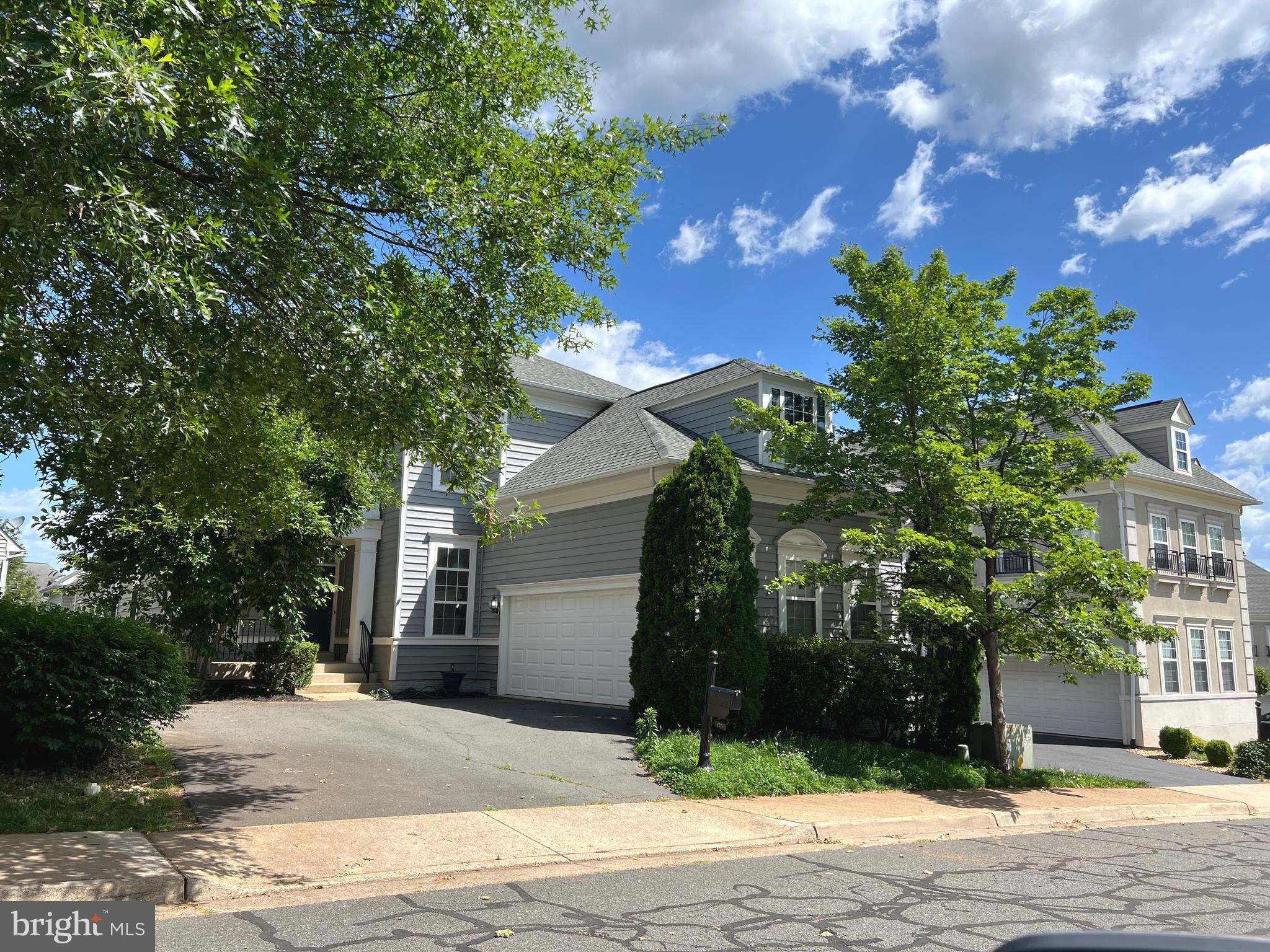 8378 Tillett Loop Manassas, VA 20110 - Photo 30 of 30 2-car side load garage and large driveway