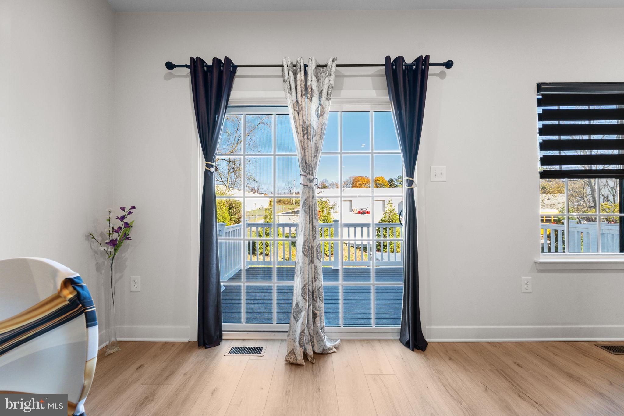 316 Longs Peak Way Exton, PA 19341 - Photo 13 of 46 a view of empty room with wooden floor and fan